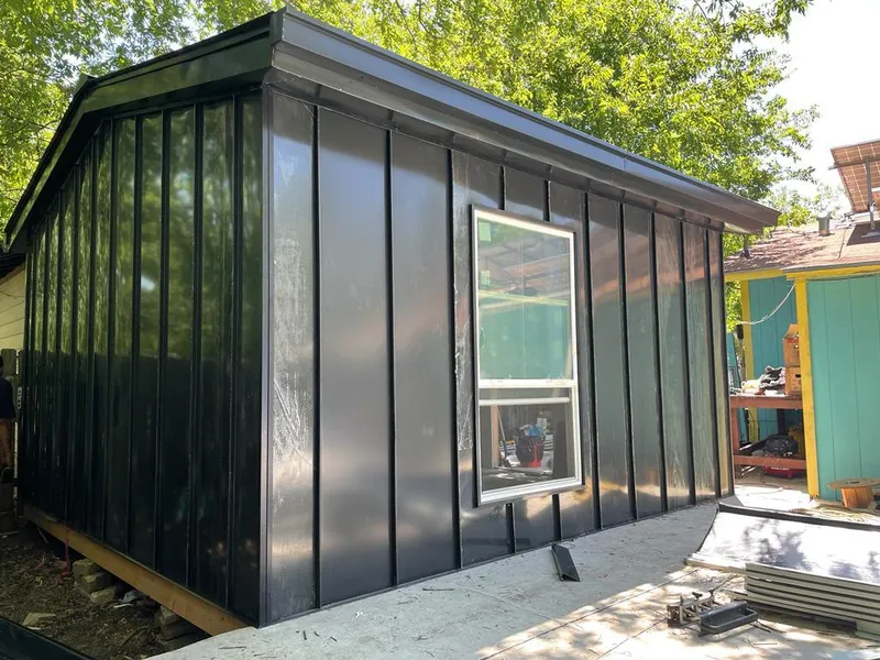 Black standing seam metal wall panels for Metal Roof Installation in Lumberton